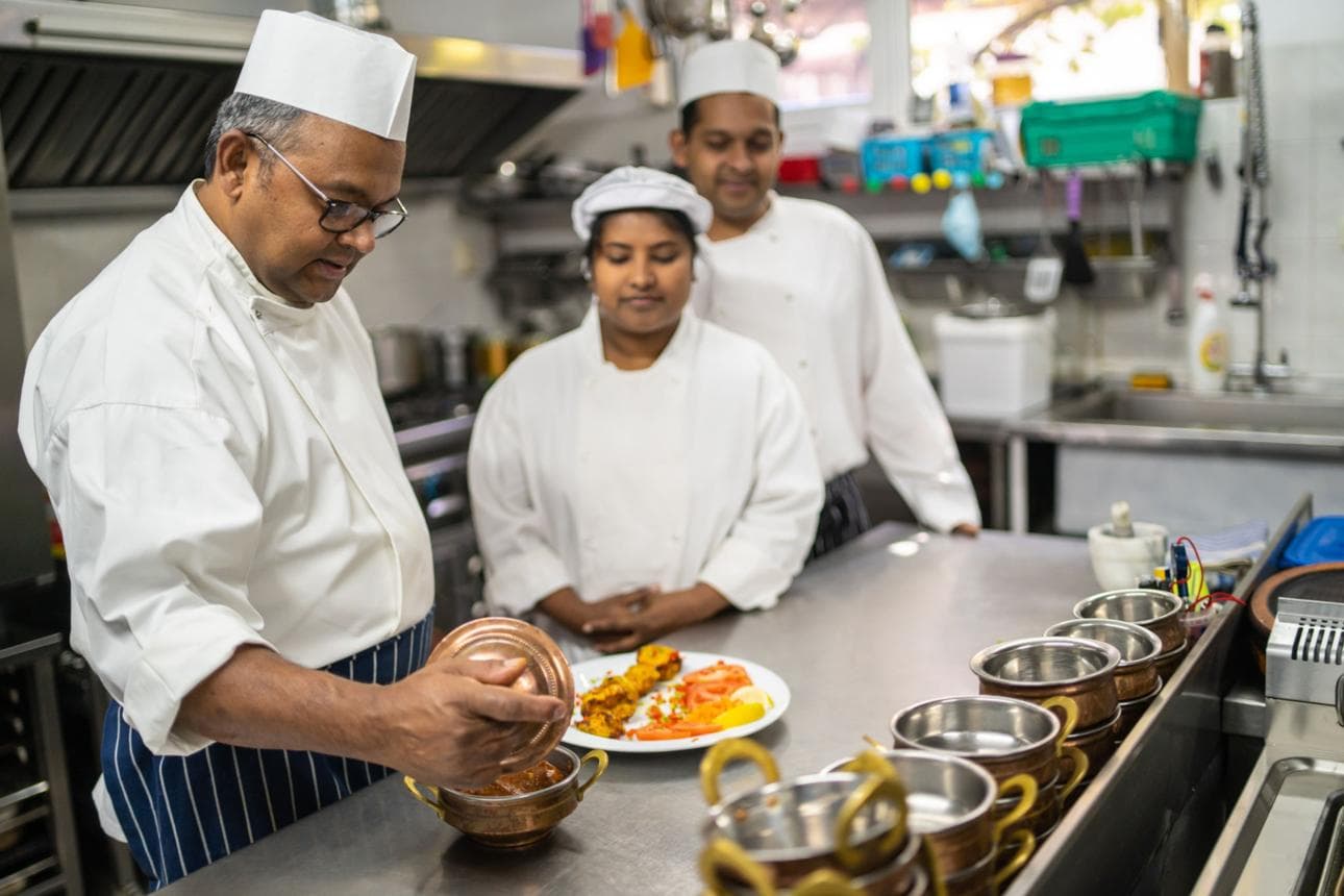 A food business owner in their kitchen